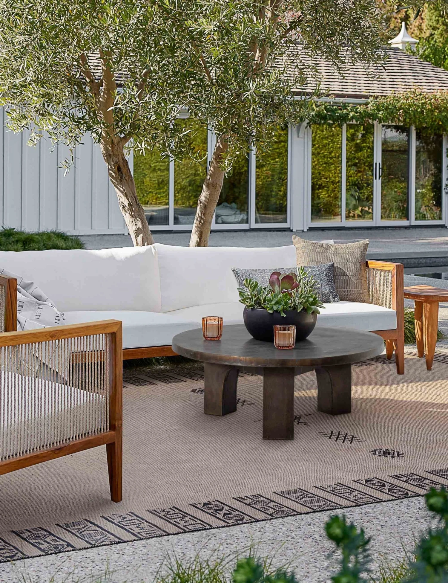 mindi_rug_living_room_indigo_1027-canta_coffee_table-site_crop_6f4c8a89-662a-4876-b5ad-102aff28f58a.jpg Lulu And Georgia Outdoor Collection Canta Indoor / Outdoor Round Coffee Table